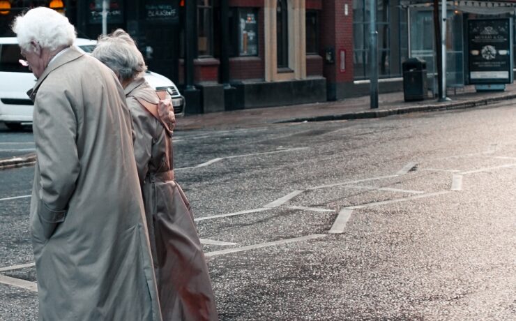 couple crossing street love city old man woman