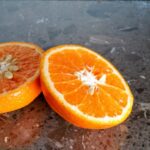 Arancia fetta metà frutta