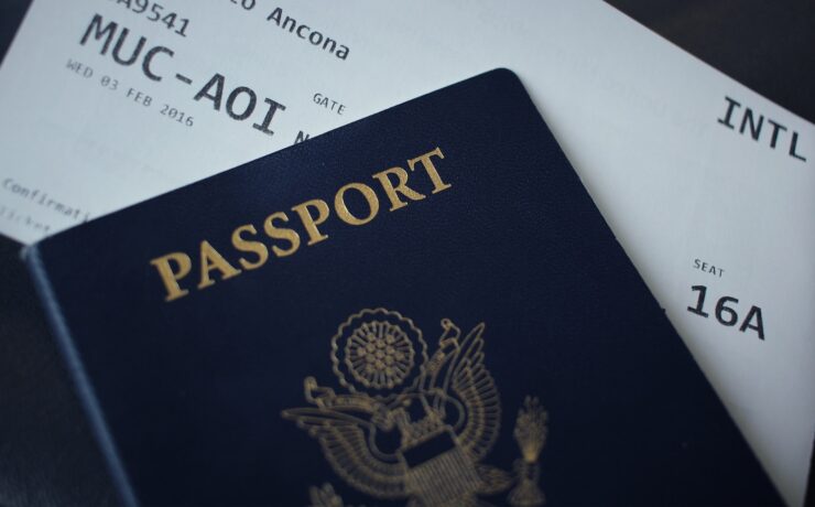 passport booklet on top of white paper american