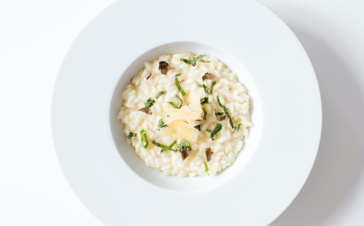 risotto on white ceramic plate italy