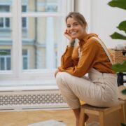 woman in the living room smiling