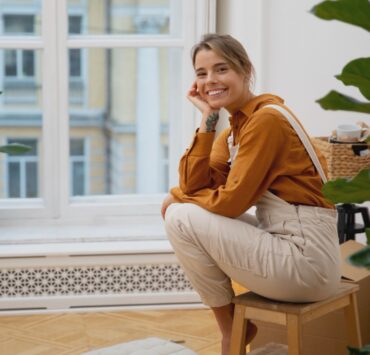 woman in the living room smiling