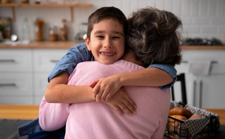 woman hugging a kid