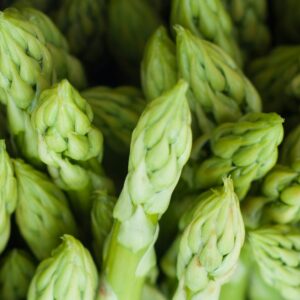 A vibrant close-up of fresh green asparagus spears capturing natural texture and freshness.