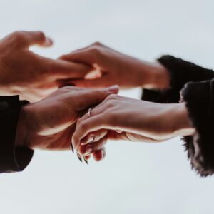 view photography of person hands while holding